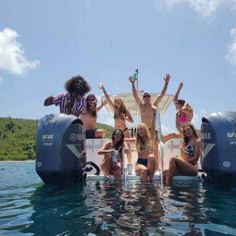 a group of people swimming in the water