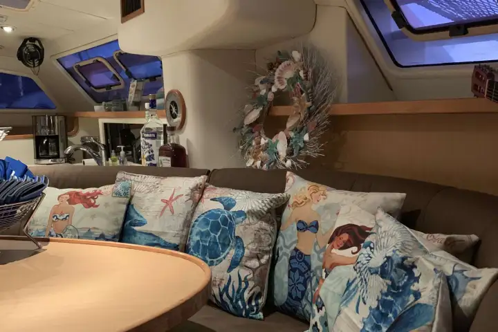 a living room filled with furniture and a window