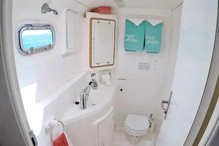 a close up of a sink and a mirror