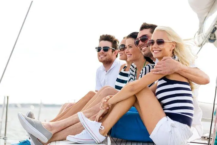 a group of people sitting posing for the camera