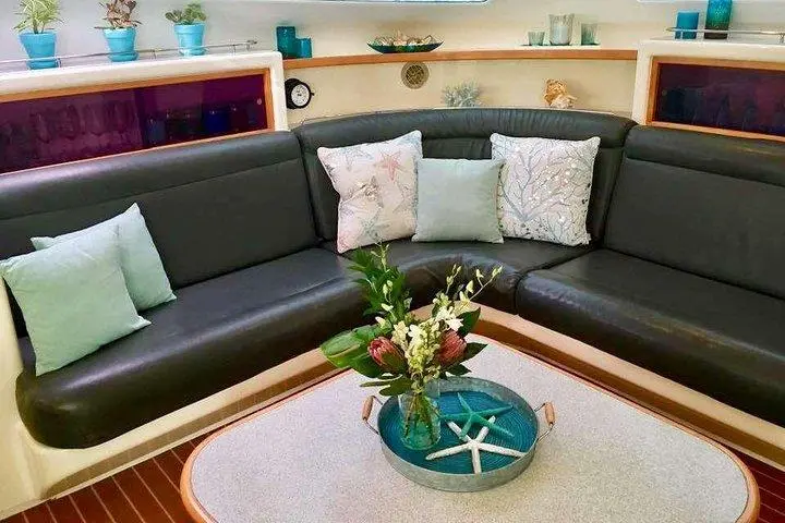 a brown leather couch in a living room