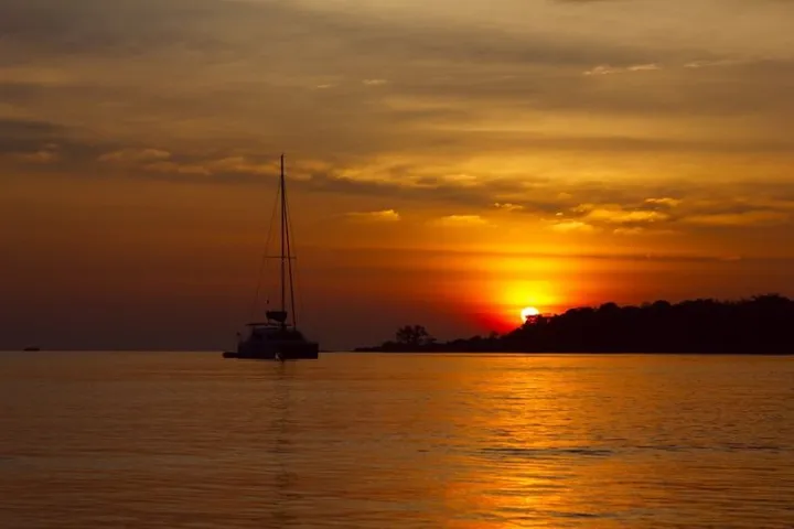 a sunset over a body of water