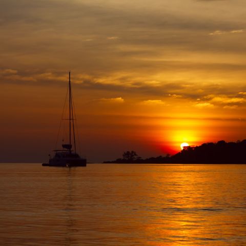 a sunset over a body of water