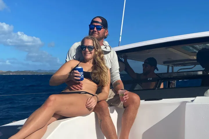 Guests relaxing on bow of Seas the Day Charters USVI M/V Hydra