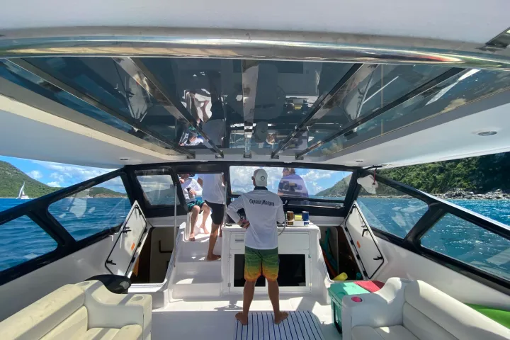 Captain manning the helm of Seas the Day Charters USVI M/V Hydra