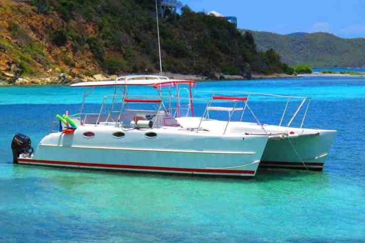 a small boat in a body of water