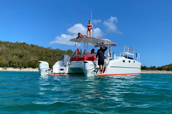 a small boat in a large body of water