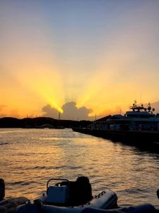 Sunset over St. Thomas USVI from Seas the Day Charters sailing catamaran