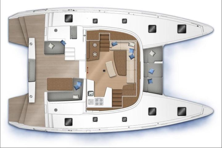 Top view of a catamaran floor plan with seating, kitchen, and outdoor areas.